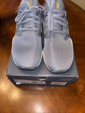New Balance ,womens Light Gray Athletic Sneakers with Gold Logo Accent